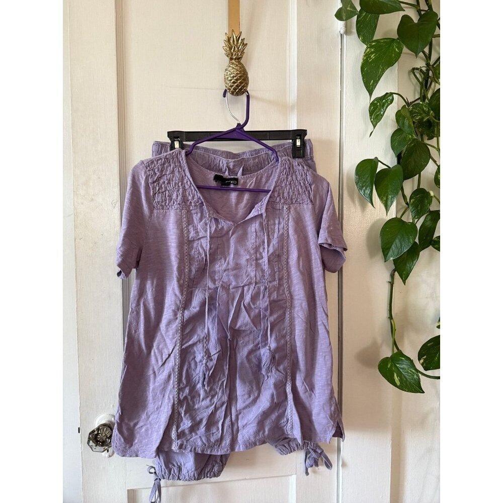 Erika women’s size medium purple two piece outfit